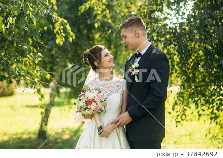 Happy bride and groom after wedding ceremony 37842692