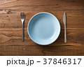 Blue Plate on brown wooden background  37846317