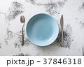 Blue Plate on white wooden background  37846318