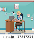 Businesswoman sitting at the desk working with 37847234