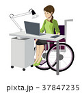 Young woman in wheelchair working with computer 37847235