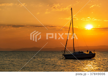Boat sailing in sea against sky during sunset Boat sailing in sea against sky during sunset 37849006