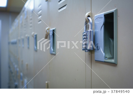 Closeup padlock with key number hanging Closeup padlock with key number hanging 37849540