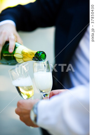 pouring Champagne pouring Champagne 37850430
