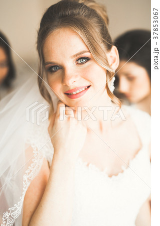 Beautiful bride wearing fashion wedding dress with Beautiful bride wearing fashion wedding dress with 37853067