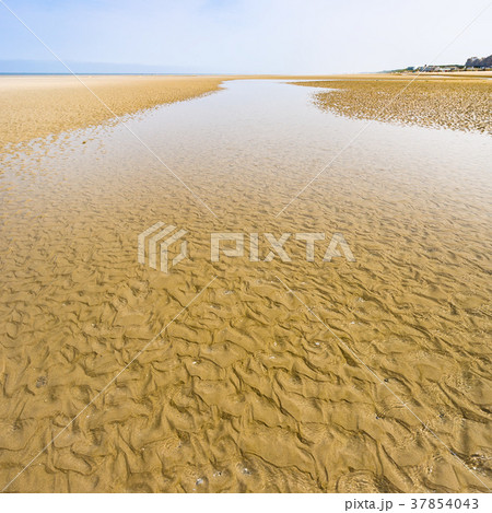 water on sand beach of Le Touquet in low tide 37854043