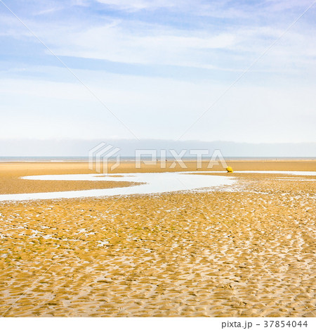 blue sky over sand beach of Le Touquet after ebb blue sky over sand beach of Le Touquet after ebb 37854044