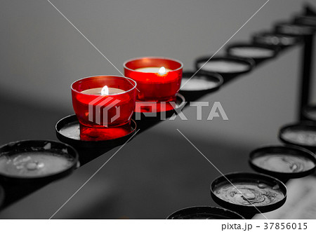 Two Red Candles in Church 37856015