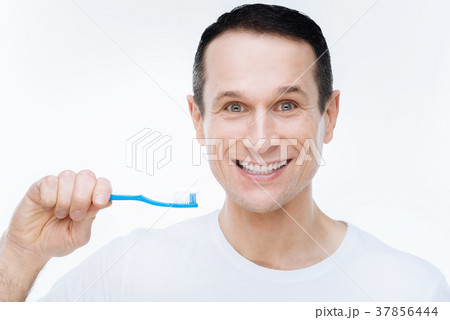 Cheerful nice man showing his smile 37856444