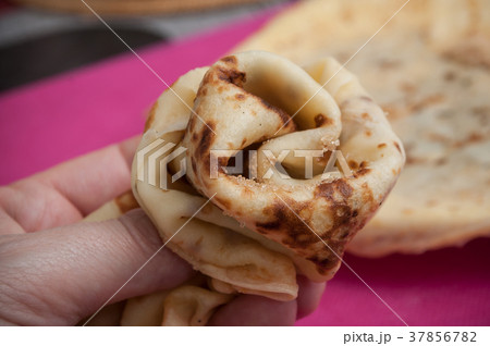 pancakes in hand pancakes in hand 37856782