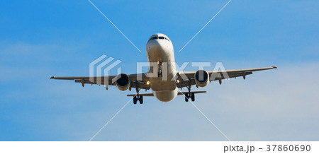 Passenger plane departing in afternoon Passenger plane departing in afternoon 37860690