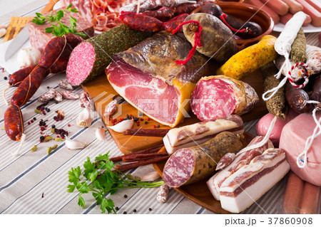 Variety of meats on table Variety of meats on table 37860908