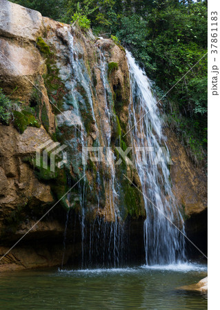 Waterfall in Catalonia surrounded by beautiful forests 37861183
