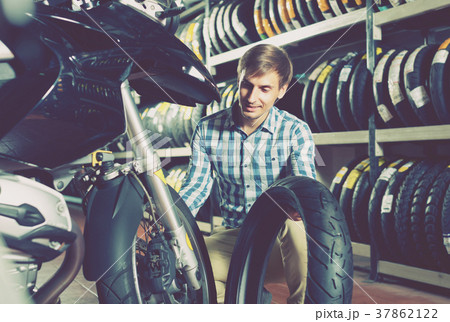 man customer buying motorcycle 37862122