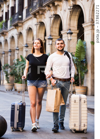 Couple going the historic city center 37862271