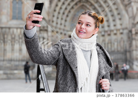 Young female making selfie Young female making selfie 37863366