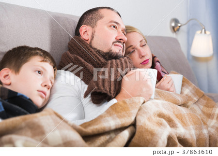 Family with son catching cold Family with son catching cold 37863610