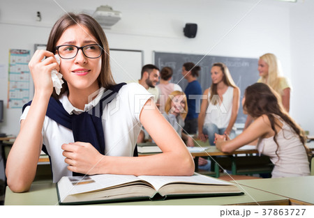 Nerd student crying in classroom 37863727
