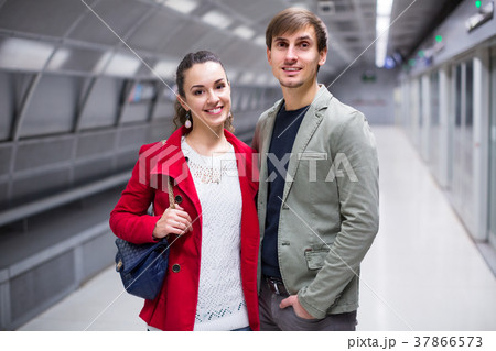 man and girl posing at metro station 37866573