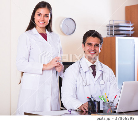 Two doctors in private clinic . 37866598