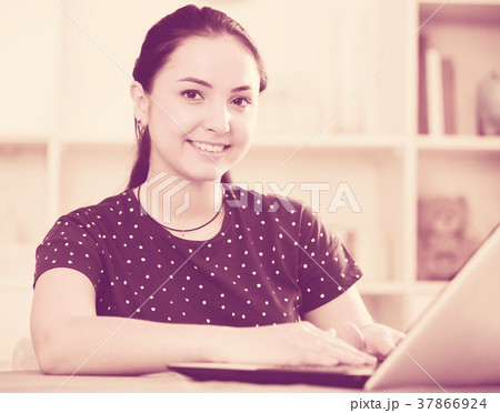 Attractive female on laptop Attractive female on laptop 37866924