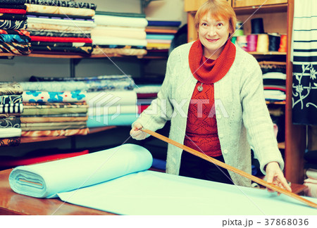 salesclerk in the tissue store salesclerk in the tissue store 37868036