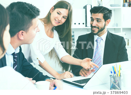 Business partners discussing in office 37869403