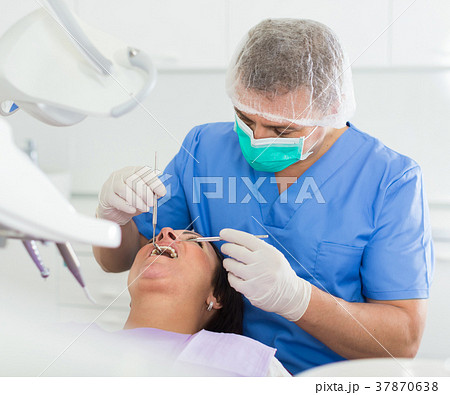 dentist professional filling teeth dentist professional filling teeth 37870638