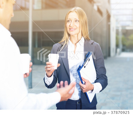 Female is talking with partner before signing contract Female is talking with partner before signing contract 37870925