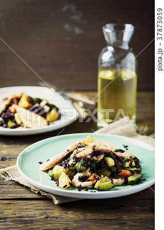 Black rice with prawns, vegetables and orange Black rice with prawns, vegetables and orange 37873059