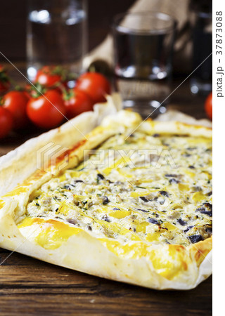 vegetarian tart with ricotta, paprika and zucchini vegetarian tart with ricotta, paprika and zucchini 37873088