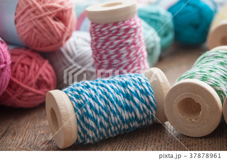 sewing thread spool bobbin on wooden table sewing thread spool bobbin on wooden table 37878961