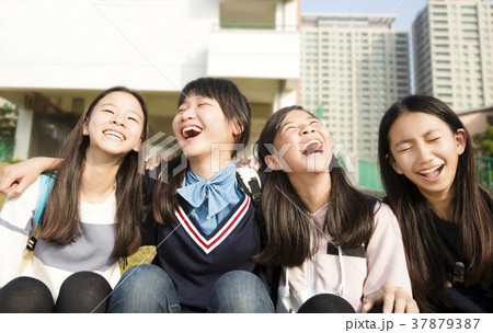Group Of Teenage Students girls having fun 37879387