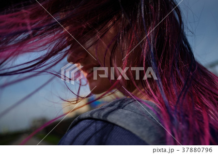 Colored blue and pink hair girl in the wind back Colored blue and pink hair girl in the wind back 37880796