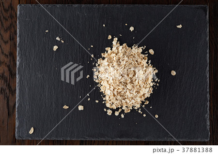 Yellow oats pyramid positioned in the corner on a 37881388
