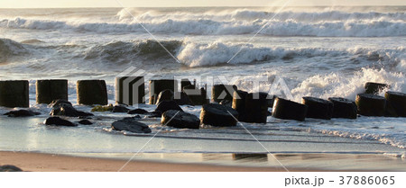 Waves chrashing on a jetty fromm hurricane hermine 37886065