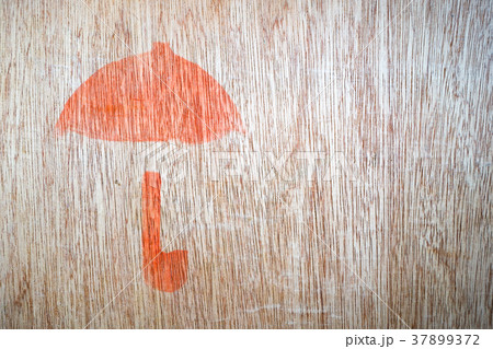 Close up of fragile symbol on wood board. 37899372
