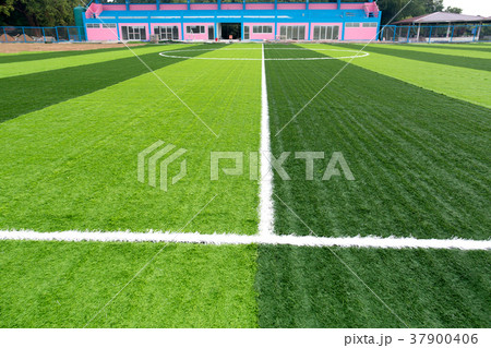 New soccer field with green artificial grass 37900406