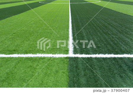 New soccer field with green artificial grass 37900407