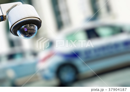 CCTV camera urban video with blur police car 37904187