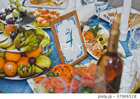 Beautifully decorated holiday table with snacks  37906528