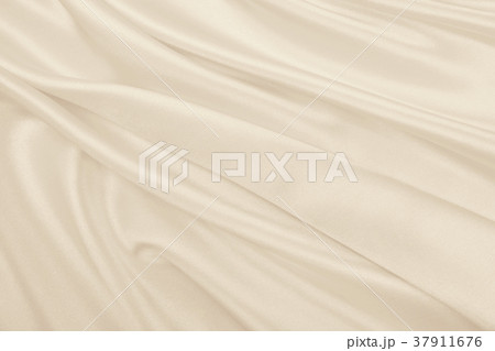 Smooth elegant golden silk or satin luxury cloth Smooth elegant golden silk or satin luxury cloth 37911676