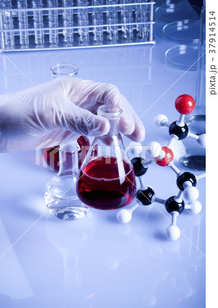 Scientist working in laboratory Scientist working in laboratory 37914514