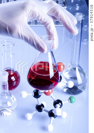 Scientist working in laboratory Scientist working in laboratory 37914516
