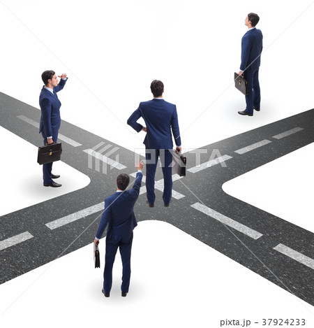 Young businessman at crossroads in uncertainty 37924233