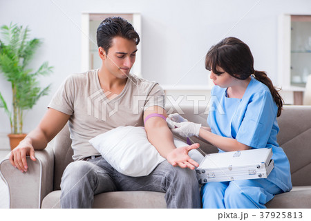 Patient getting blood transfusion in hospital Patient getting blood transfusion in hospital 37925813