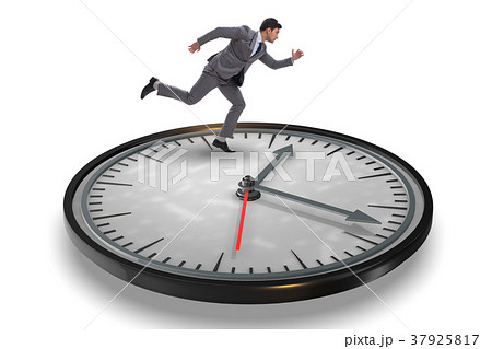 Businessman in time management concept Businessman in time management concept 37925817