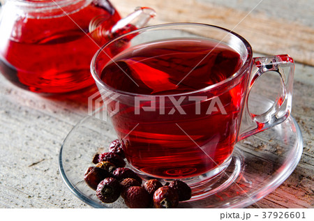 Fruit berry tea in the cup served on table 37926601