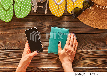 Woman planning a beach trip Woman planning a beach trip 37932562
