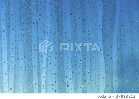 Rain on the glass Rain on the glass 37933512
